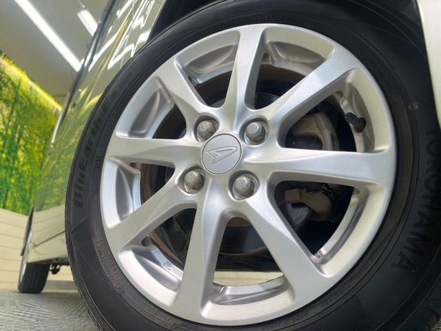 タント Gスペシャル 電動スライドドア SDナビ バックカメラ 地デジ 禁煙車 スマートキー アイドリングストップ オートエアコン 純正14インチアルミ ヘッドライトレベライザー CD DVD再生(13枚目)