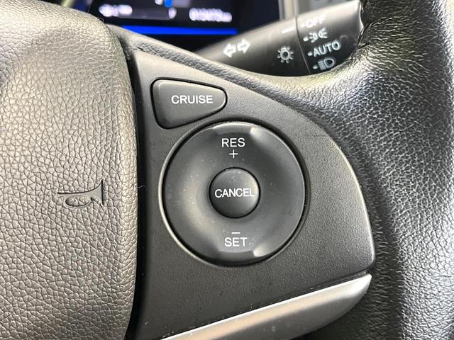 フィットハイブリッド Lパッケージ 純正ナビ バックカメラ 禁煙車 衝突軽減装置 クルーズコントロール LEDヘッド オートライト スマートキー 電動格納ミラー オートエアコン ドラレコ 純正革巻きステアリング ドアバイザー(6枚目)