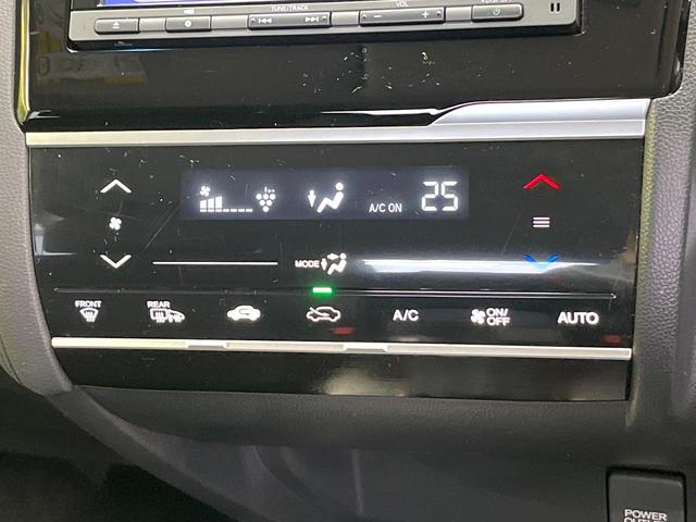 フィットハイブリッド Lパッケージ 純正ナビ バックカメラ 禁煙車 衝突軽減装置 クルーズコントロール LEDヘッド オートライト スマートキー 電動格納ミラー オートエアコン ドラレコ 純正革巻きステアリング ドアバイザー(29枚目)