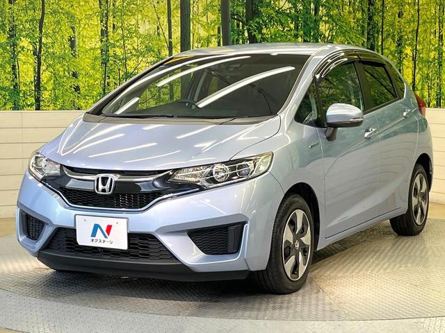 フィットハイブリッド Lパッケージ 純正ナビ バックカメラ 禁煙車 衝突軽減装置 クルーズコントロール LEDヘッド オートライト スマートキー 電動格納ミラー オートエアコン ドラレコ 純正革巻きステアリング ドアバイザー(55枚目)