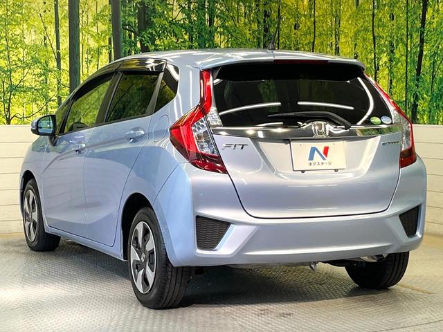 フィットハイブリッド Lパッケージ 純正ナビ バックカメラ 禁煙車 衝突軽減装置 クルーズコントロール LEDヘッド オートライト スマートキー 電動格納ミラー オートエアコン ドラレコ 純正革巻きステアリング ドアバイザー(57枚目)