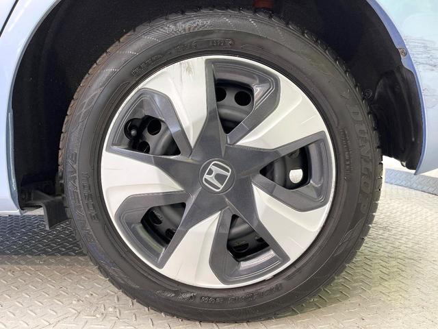 フィットハイブリッド Lパッケージ 純正ナビ バックカメラ 禁煙車 衝突軽減装置 クルーズコントロール LEDヘッド オートライト スマートキー 電動格納ミラー オートエアコン ドラレコ 純正革巻きステアリング ドアバイザー(62枚目)