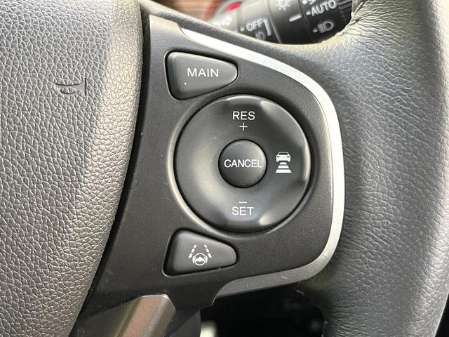 フリードハイブリッド ハイブリッド・クロスターホンダセンシング 両側電動ドア SDナビ バックカメラ 衝突被害軽減システム レーダークルーズ ハーフレザーシート スマートキー LEDヘッド ビルトインETC 車線逸脱警報 オートライト デュアルエアコン(5枚目)