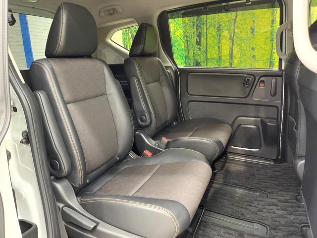 フリードハイブリッド ハイブリッド・クロスターホンダセンシング 両側電動ドア SDナビ バックカメラ 衝突被害軽減システム レーダークルーズ ハーフレザーシート スマートキー LEDヘッド ビルトインETC 車線逸脱警報 オートライト デュアルエアコン(9枚目)