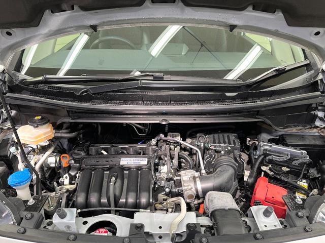 フリードハイブリッド ハイブリッド・クロスターホンダセンシング 両側電動ドア SDナビ バックカメラ 衝突被害軽減システム レーダークルーズ ハーフレザーシート スマートキー LEDヘッド ビルトインETC 車線逸脱警報 オートライト デュアルエアコン(18枚目)