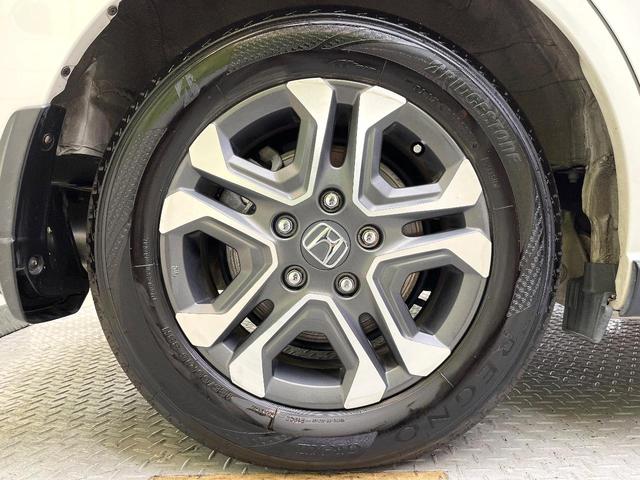 フリードハイブリッド ハイブリッド・クロスターホンダセンシング 両側電動ドア SDナビ バックカメラ 衝突被害軽減システム レーダークルーズ ハーフレザーシート スマートキー LEDヘッド ビルトインETC 車線逸脱警報 オートライト デュアルエアコン(28枚目)