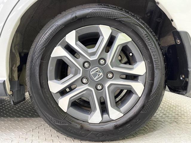 フリードハイブリッド ハイブリッド・クロスターホンダセンシング 両側電動ドア SDナビ バックカメラ 衝突被害軽減システム レーダークルーズ ハーフレザーシート スマートキー LEDヘッド ビルトインETC 車線逸脱警報 オートライト デュアルエアコン(29枚目)