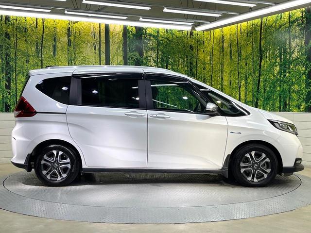 フリードハイブリッド ハイブリッド・クロスターホンダセンシング 両側電動ドア SDナビ バックカメラ 衝突被害軽減システム レーダークルーズ ハーフレザーシート スマートキー LEDヘッド ビルトインETC 車線逸脱警報 オートライト デュアルエアコン(34枚目)