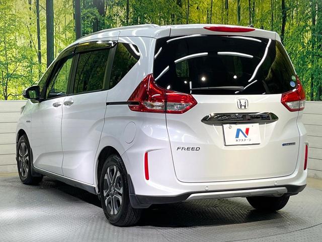 フリードハイブリッド ハイブリッド・クロスターホンダセンシング 両側電動ドア SDナビ バックカメラ 衝突被害軽減システム レーダークルーズ ハーフレザーシート スマートキー LEDヘッド ビルトインETC 車線逸脱警報 オートライト デュアルエアコン(35枚目)