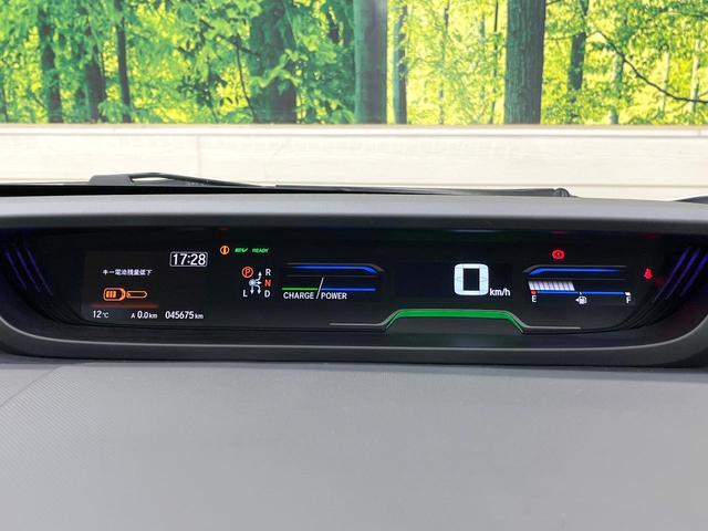 フリードハイブリッド ハイブリッド・クロスターホンダセンシング 両側電動ドア SDナビ バックカメラ 衝突被害軽減システム レーダークルーズ ハーフレザーシート スマートキー LEDヘッド ビルトインETC 車線逸脱警報 オートライト デュアルエアコン(50枚目)