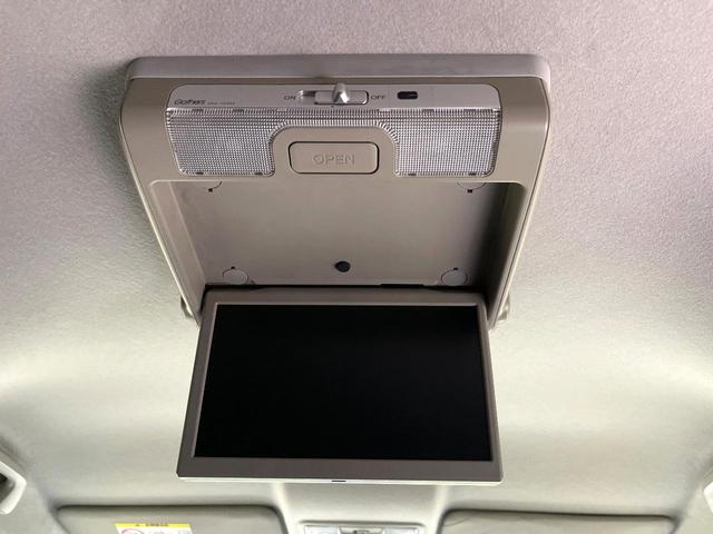 N-BOXカスタム 2トーンカラースタイル G・ターボLパッケージ フリップダウンモニター 純正8型ナビ 衝突軽減装置 禁煙車 バックカメラ 両側電動ドア オートエアコン オートライト ETC スマートキー ハーフレザー Bluetooth再生 電動格納ミラー(3枚目)