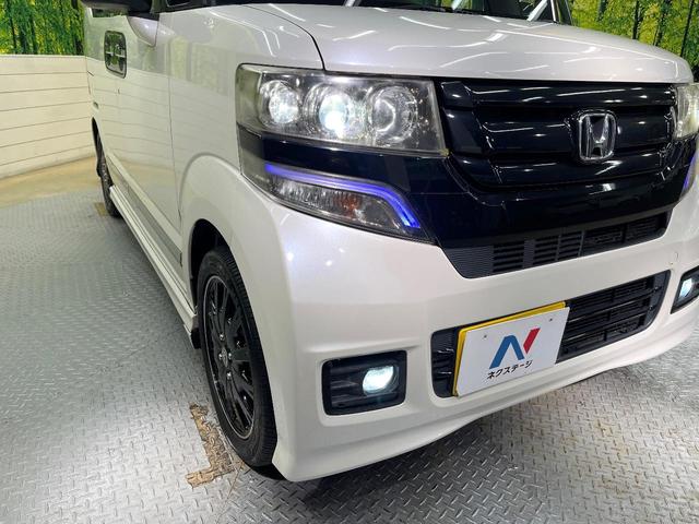 N-BOXカスタム 2トーンカラースタイル G・ターボLパッケージ フリップダウンモニター 純正8型ナビ 衝突軽減装置 禁煙車 バックカメラ 両側電動ドア オートエアコン オートライト ETC スマートキー ハーフレザー Bluetooth再生 電動格納ミラー(12枚目)