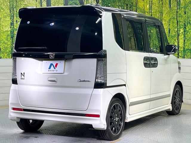 N-BOXカスタム 2トーンカラースタイル G・ターボLパッケージ フリップダウンモニター 純正8型ナビ 衝突軽減装置 禁煙車 バックカメラ 両側電動ドア オートエアコン オートライト ETC スマートキー ハーフレザー Bluetooth再生 電動格納ミラー(17枚目)