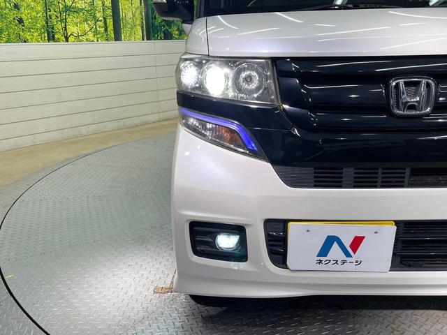 N-BOXカスタム 2トーンカラースタイル G・ターボLパッケージ フリップダウンモニター 純正8型ナビ 衝突軽減装置 禁煙車 バックカメラ 両側電動ドア オートエアコン オートライト ETC スマートキー ハーフレザー Bluetooth再生 電動格納ミラー(54枚目)
