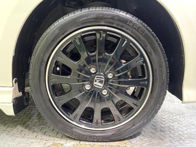 N-BOXカスタム 2トーンカラースタイル G・ターボLパッケージ フリップダウンモニター 純正8型ナビ 衝突軽減装置 禁煙車 バックカメラ 両側電動ドア オートエアコン オートライト ETC スマートキー ハーフレザー Bluetooth再生 電動格納ミラー(62枚目)