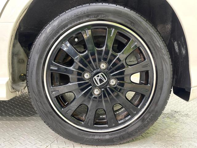 N-BOXカスタム 2トーンカラースタイル G・ターボLパッケージ フリップダウンモニター 純正8型ナビ 衝突軽減装置 禁煙車 バックカメラ 両側電動ドア オートエアコン オートライト ETC スマートキー ハーフレザー Bluetooth再生 電動格納ミラー(64枚目)