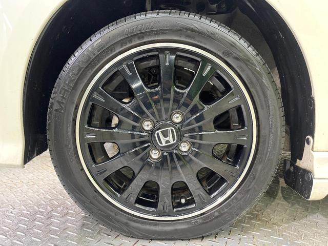 N-BOXカスタム 2トーンカラースタイル G・ターボLパッケージ フリップダウンモニター 純正8型ナビ 衝突軽減装置 禁煙車 バックカメラ 両側電動ドア オートエアコン オートライト ETC スマートキー ハーフレザー Bluetooth再生 電動格納ミラー(65枚目)