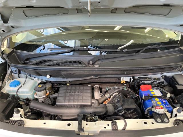 N-BOX L ホンダセンシング 純正8型ナビ バックカメラ フルセグ 電動スライドドア シートヒーター レーダークルーズ LEDヘッド 禁煙車 ロールサンシェード ドラレコ オートエアコン シートバックテーブル(18枚目)