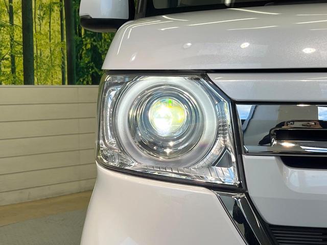 N-BOX L ホンダセンシング 純正8型ナビ バックカメラ フルセグ 電動スライドドア シートヒーター レーダークルーズ LEDヘッド 禁煙車 ロールサンシェード ドラレコ オートエアコン シートバックテーブル(24枚目)