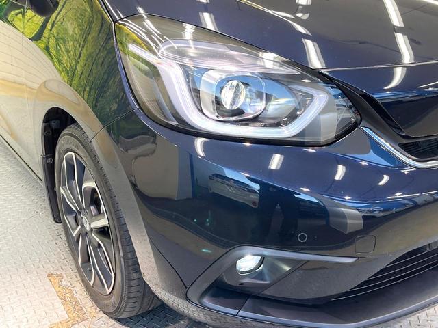 フィット ｅ：ＨＥＶホーム　ホンダセンシング　９型ホンダコネクトディスプレイ　バックカメラ　フルセグ　アダプティブクルーズ　純正１６インチアルミ　ステアリングスイッチ　ＬＥＤヘッド　オートハイビーム　オートエアコン　スマートキー（12枚目）