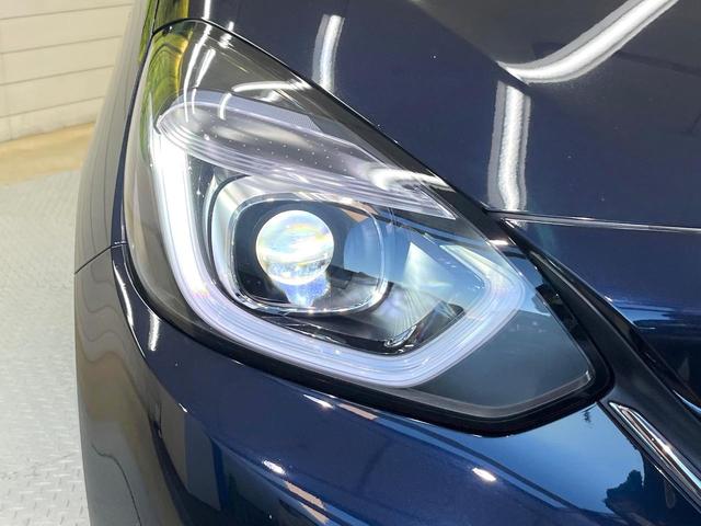 フィット ｅ：ＨＥＶホーム　ホンダセンシング　９型ホンダコネクトディスプレイ　バックカメラ　フルセグ　アダプティブクルーズ　純正１６インチアルミ　ステアリングスイッチ　ＬＥＤヘッド　オートハイビーム　オートエアコン　スマートキー（30枚目）