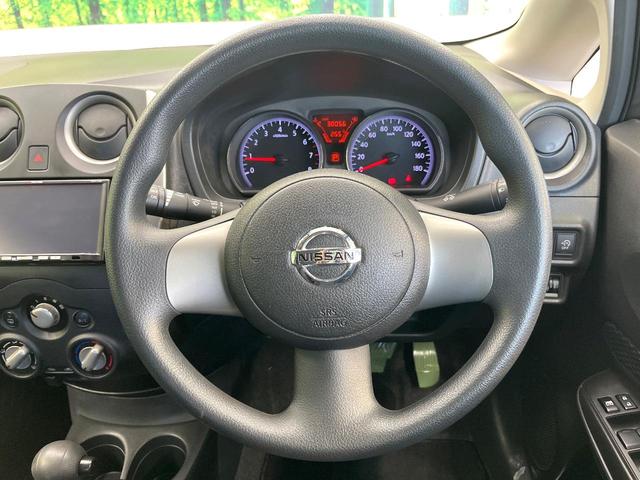 ノート Ｘ　ＳＤナビ　アイドリングストップ　スマートキー　電動格納ミラー　ヘッドライトレベライザー　エアコン　プライバシーガラス　盗難防止装置（11枚目）
