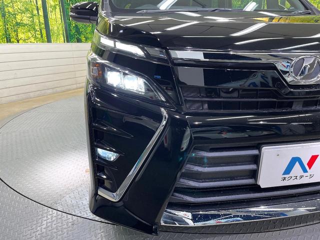 ヴォクシー ＺＳ　後期型　セーフティセンス　純正１０型ナビ　バックカメラ　両側電動ドア　７人乗り　ＬＥＤヘッド　禁煙車　ＥＴＣ　ドラレコ　純正１６インチアルミ　ロールサンシェード　スマートキー　シートバックテーブル（24枚目）