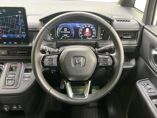 ステップワゴン ｅ：ＨＥＶスパーダ　純正１１．４型ナビ　バックカメラ　ホンダセンシング　両側電動ドア　レーダークルーズコントロール　ＥＴＣ　シートヒーター　オートエアコン　パワーバックドア　スマートキー　電動格納ミラー　ハーフレザー（12枚目）