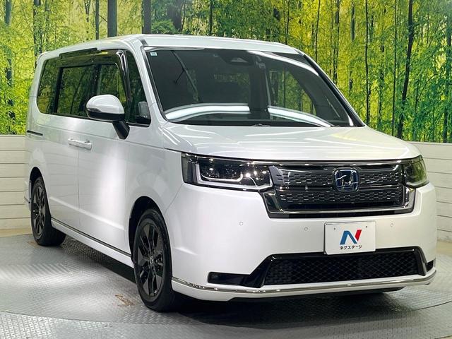 ステップワゴン ｅ：ＨＥＶスパーダ　純正１１．４型ナビ　バックカメラ　ホンダセンシング　両側電動ドア　レーダークルーズコントロール　ＥＴＣ　シートヒーター　オートエアコン　パワーバックドア　スマートキー　電動格納ミラー　ハーフレザー（17枚目）