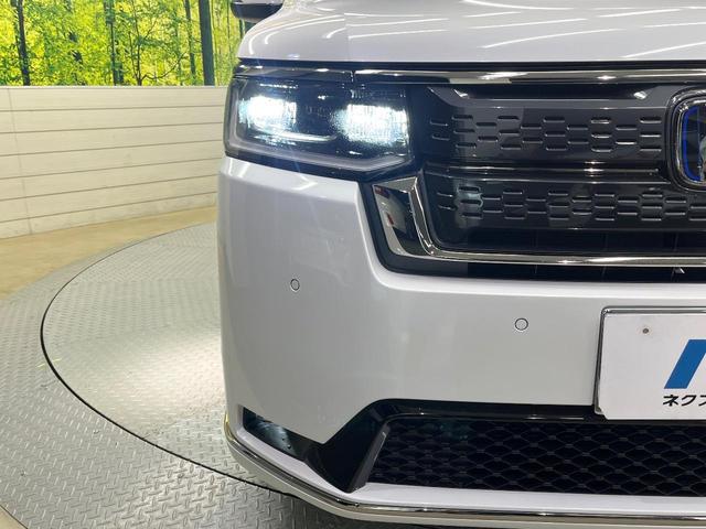 ステップワゴン ｅ：ＨＥＶスパーダ　純正１１．４型ナビ　バックカメラ　ホンダセンシング　両側電動ドア　レーダークルーズコントロール　ＥＴＣ　シートヒーター　オートエアコン　パワーバックドア　スマートキー　電動格納ミラー　ハーフレザー（65枚目）