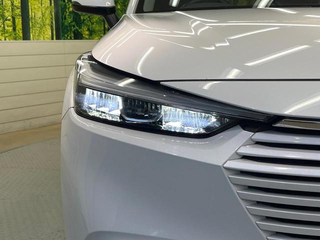 ヴェゼル e:HEV Z バックカメラ 衝突被害軽減システム 禁煙車 電動リアゲート ハーフレザーシート ドラレコ コーナーセンサー スマートキー LEDヘッド ETC 純正18インチアルミ 車線逸脱警報 オートライト(21枚目)