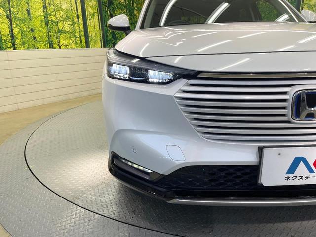 ヴェゼル e:HEV Z バックカメラ 衝突被害軽減システム 禁煙車 電動リアゲート ハーフレザーシート ドラレコ コーナーセンサー スマートキー LEDヘッド ETC 純正18インチアルミ 車線逸脱警報 オートライト(23枚目)