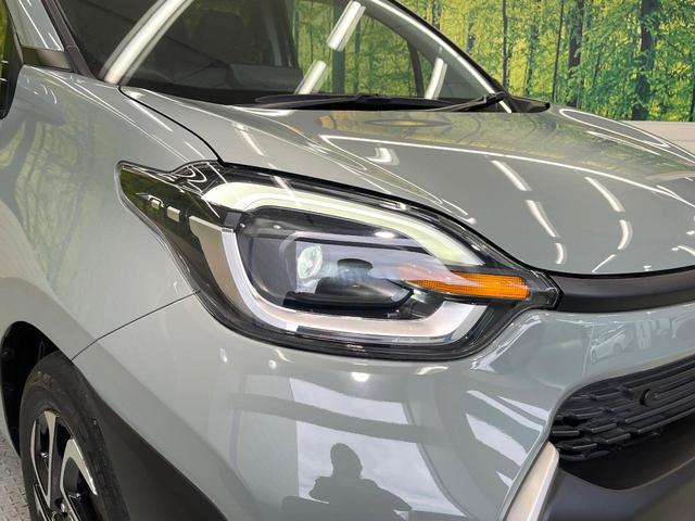 シエンタ ハイブリッドZ 両側電動ドア 全周囲カメラ 衝突被害軽減システム レーダークルーズ ドラレコ コーナーセンサー ETC 純正15インチアルミ オートハイビーム 車線逸脱警報 ステアリングヒーター AC100V電源(14枚目)