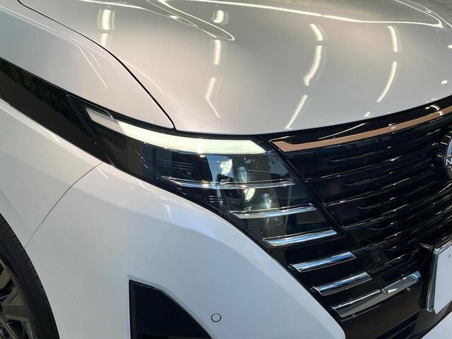 セレナ ｅ－パワー　ハイウェイスターＶ　９０周年記念車　寒冷地仕様　純正１２．３型ナビ　全周囲カメラ　フルセグ　プロパイロット　デジタルインナーミラー　ワイヤレス充電　ハンズフリー機能付両側電動ドア　リアオートエアコン　ブラインドスポットモニター（12枚目）