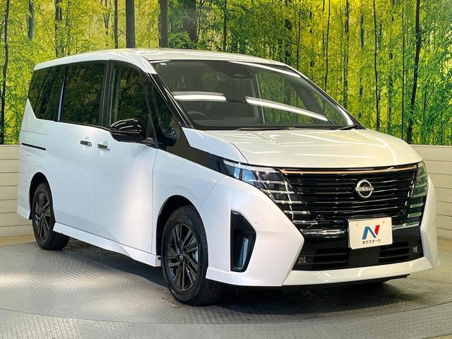 セレナ ｅ－パワー　ハイウェイスターＶ　９０周年記念車　寒冷地仕様　純正１２．３型ナビ　全周囲カメラ　フルセグ　プロパイロット　デジタルインナーミラー　ワイヤレス充電　ハンズフリー機能付両側電動ドア　リアオートエアコン　ブラインドスポットモニター（16枚目）