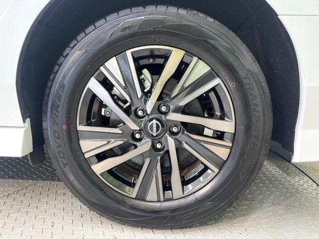 セレナ ｅ－パワー　ハイウェイスターＶ　９０周年記念車　寒冷地仕様　純正１２．３型ナビ　全周囲カメラ　フルセグ　プロパイロット　デジタルインナーミラー　ワイヤレス充電　ハンズフリー機能付両側電動ドア　リアオートエアコン　ブラインドスポットモニター（28枚目）