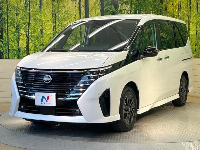 セレナ ｅ－パワー　ハイウェイスターＶ　９０周年記念車　寒冷地仕様　純正１２．３型ナビ　全周囲カメラ　フルセグ　プロパイロット　デジタルインナーミラー　ワイヤレス充電　ハンズフリー機能付両側電動ドア　リアオートエアコン　ブラインドスポットモニター（30枚目）