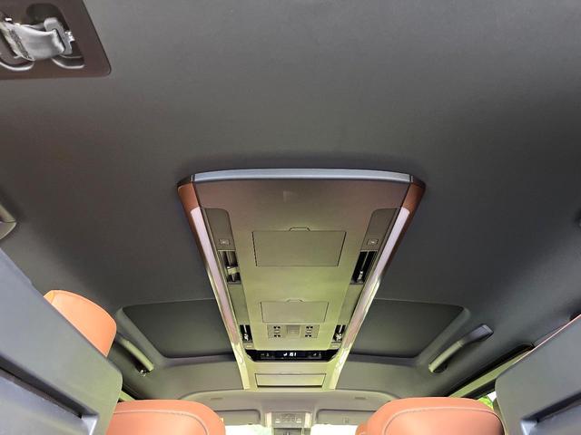 ヴェルファイアハイブリッド Ｚ　プレミア　モデリスタエアロ　ガラスルーフ　後席モニター　全周囲カメラ　１００Ｖ電源　両側電動ドア　シートベンチレーション　レーダークルーズ　茶革シート　前後席パワーシート　ブラインドスポット　オットマン（56枚目）