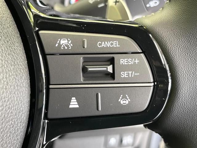 N-BOXカスタム ターボコーディネートスタイル ターボ 両側電動ドア 衝突被害軽減システム レザー調シート レーダークルーズ シートヒーター パドルシフト LEDヘッド・フォグ純正15インチアルミ 車線逸脱警報 オートライト オートエアコン(3枚目)