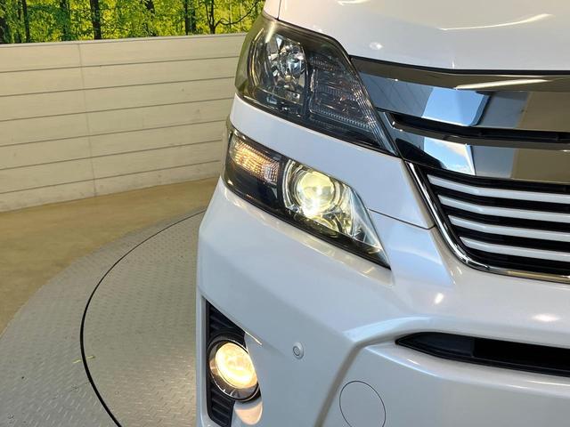 ヴェルファイア 2.4Z ゴールデンアイズII フリップダウンモニター BIGX10型ナビ バックカメラ フルセグ クルーズコントロール 両側電動ドア 電動リアゲート リアオートエアコン AC100V電源 HIDヘッド オートライト スマートキー(23枚目)