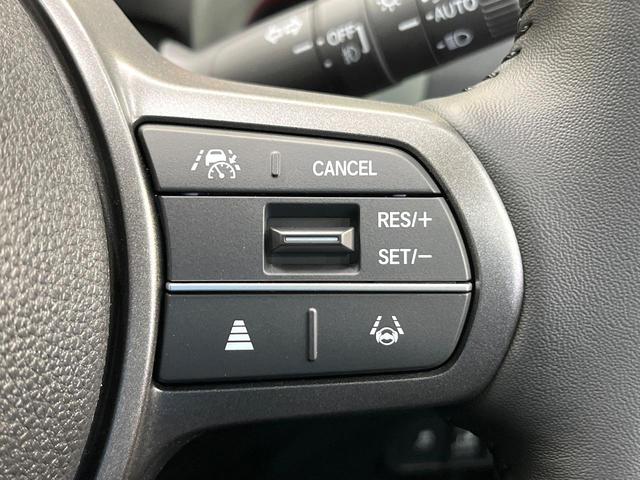 フリード クロスター　登録済未使用車　純正９型ナビ　バックカメラ　ホンダセンシング　レーダークルーズ　両側電動ドア　ハーフレザー　シートヒーター　ブラインドスポットモニター　オートエアコン　スマートキー　ＬＥＤヘッド（7枚目）