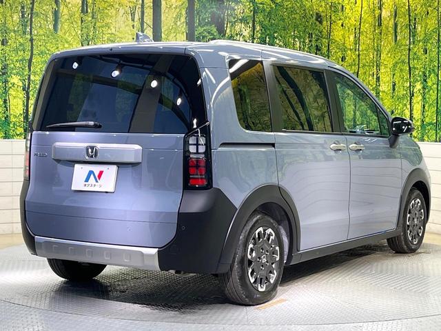 フリード クロスター　登録済未使用車　純正９型ナビ　バックカメラ　ホンダセンシング　レーダークルーズ　両側電動ドア　ハーフレザー　シートヒーター　ブラインドスポットモニター　オートエアコン　スマートキー　ＬＥＤヘッド（18枚目）