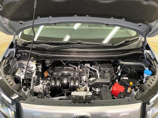 フリード クロスター　登録済未使用車　純正９型ナビ　バックカメラ　ホンダセンシング　レーダークルーズ　両側電動ドア　ハーフレザー　シートヒーター　ブラインドスポットモニター　オートエアコン　スマートキー　ＬＥＤヘッド（19枚目）