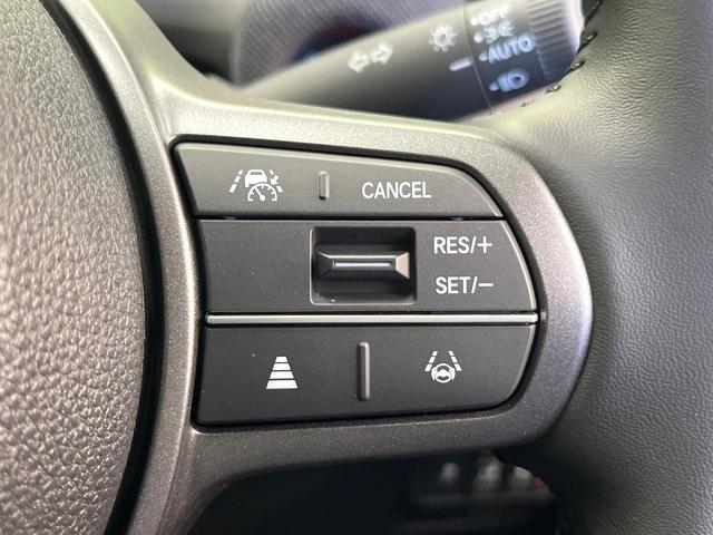 フリード ｅ：ＨＥＶエアー　ＥＸ　登録済未使用車　ホンダセンシング　アダプティブクルーズ　両側電動ドア　シートヒーター　ステアリングヒーター　ブラインドスポットモニター　ＬＥＤヘッド　オートハイビーム　オートエアコン　スマートキー（7枚目）