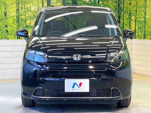 フリード ｅ：ＨＥＶエアー　ＥＸ　登録済未使用車　ホンダセンシング　アダプティブクルーズ　両側電動ドア　シートヒーター　ステアリングヒーター　ブラインドスポットモニター　ＬＥＤヘッド　オートハイビーム　オートエアコン　スマートキー（15枚目）