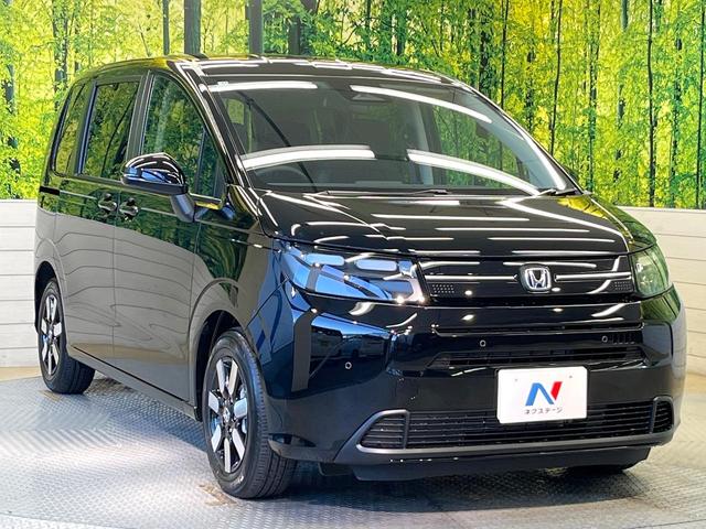 フリード ｅ：ＨＥＶエアー　ＥＸ　登録済未使用車　ホンダセンシング　アダプティブクルーズ　両側電動ドア　シートヒーター　ステアリングヒーター　ブラインドスポットモニター　ＬＥＤヘッド　オートハイビーム　オートエアコン　スマートキー（17枚目）