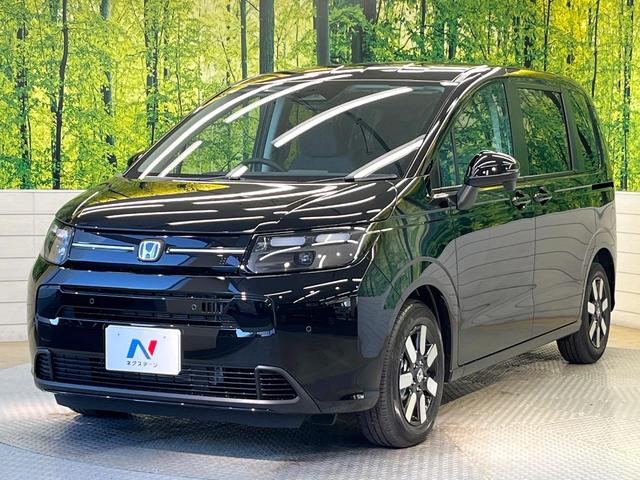 フリード ｅ：ＨＥＶエアー　ＥＸ　登録済未使用車　ホンダセンシング　アダプティブクルーズ　両側電動ドア　シートヒーター　ステアリングヒーター　ブラインドスポットモニター　ＬＥＤヘッド　オートハイビーム　オートエアコン　スマートキー（31枚目）