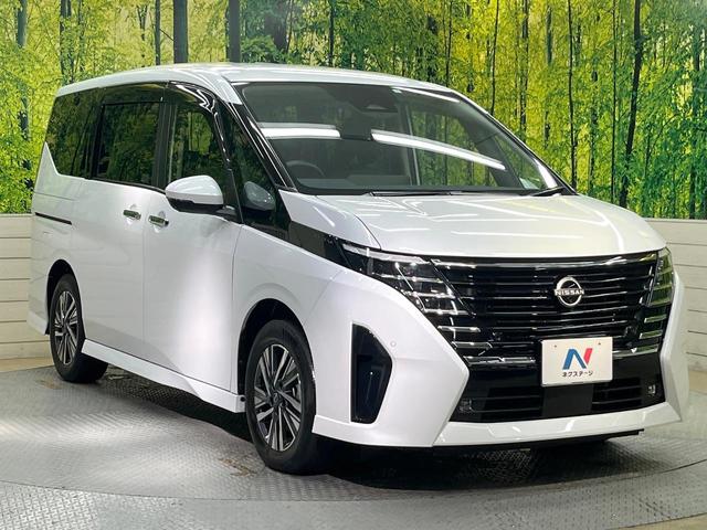 セレナ ハイウェイスターV フリップダウンモニター 純正12.3型ナビ 全周囲カメラ デジタルインナーミラー ワイヤレス充電 防水シート プロパイロット ハンズフリー機能付両側電動ドア リアオートエアコン LEDヘッド&フォグ(17枚目)