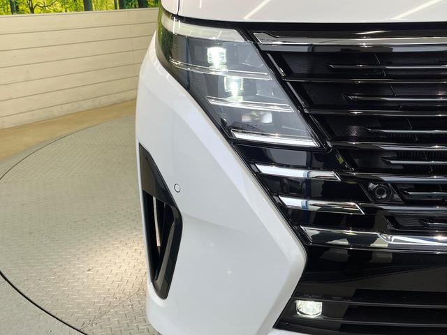 セレナ ｅ－パワー　ハイウェイスターＶ　登録済未使用車　純正１２．３型ナビ　全周囲カメラ　フルセグ　プロパイロット　ワイヤレス充電　ハンズフリー機能付両側電動ドア　リアオートエアコン　ＬＥＤヘッド＆フォグ　純正１６インチアルミ　スマートキー（23枚目）