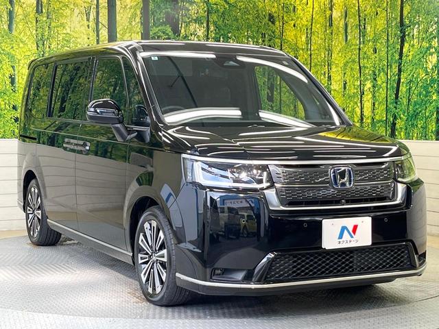 ステップワゴン ｅ：ＨＥＶスパーダ　プレミアムライン　ホンダセンシング　１１型コネクトディスプレイ　フリップダウンモニター　マルチビューカメラ　パワーバックドア　前席／２列目シートヒーター　ブラインドスポットモニター　レーダークルーズ　両側電動ドア（17枚目）